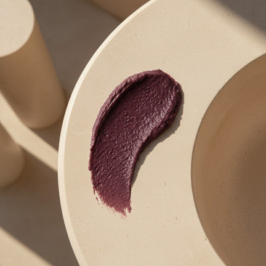 Plum Terra Face Mask product with purple clay texture visible