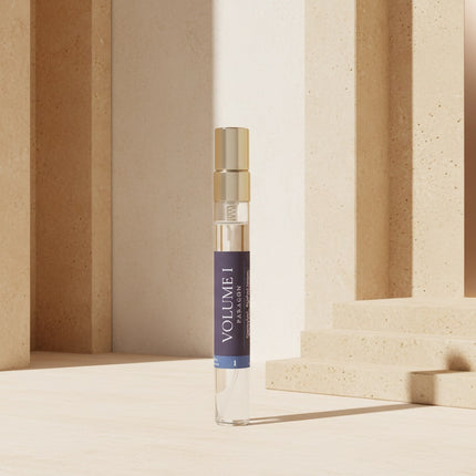 Vial labeled 'Volume 1' against a neutral background